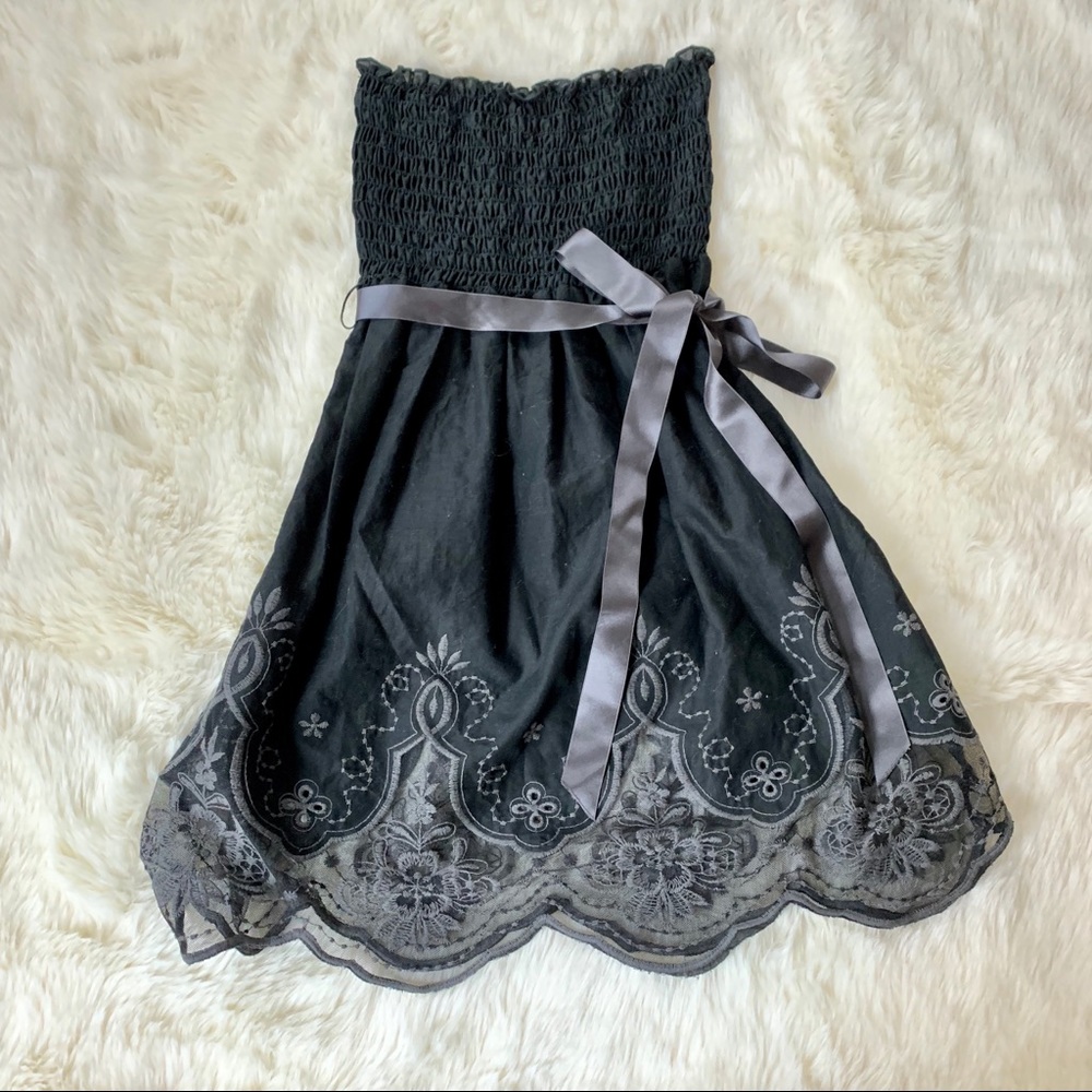 Black tunic with bow ribbon